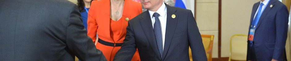 putin theresa may